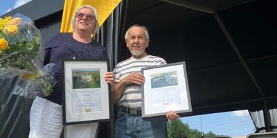 Rina en Jos ontvangen eretitel